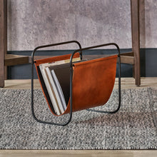Charger l'image dans la galerie, Handcrafted magazine rack in vintage brown leather on a steel frame, stylish and practical storage solution.
