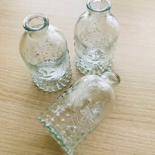 Load image into Gallery viewer, A set of three of Fleur De Lis bottle bud vases