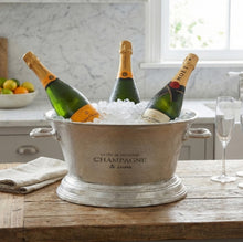 Load image into Gallery viewer, Wine cooler with three champagne bottles on ice in large antique matt silver metal bucket.