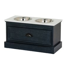 Lade das Bild in den Galerie-Viewer, Pet feeding station table in black wood featuring two stainless steel bowls and a storage drawer.
