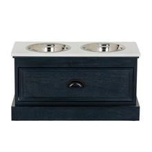 Lade das Bild in den Galerie-Viewer, Pet feeding station table in black wood with two stainless steel bowls and a storage drawer.