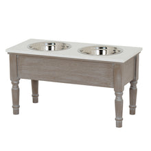 Carica l'immagine nel visualizzatore di Gallery, Pet feeding station table in grey wash wood with two stainless steel bowls for dogs and cats.