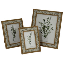 Lade das Bild in den Galerie-Viewer, Photo frame with subtle leaf border in multiple sizes for home decor.