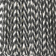 Lade das Bild in den Galerie-Viewer, Lampshade fabric featuring a black and white chevron design, showcasing a mushroom pleat texture with vivid geometric patterns.
