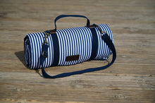 Indlæs billede til gallerivisning Picnic blanket in a blue and white design, rolled up with a strap and handles and shoulder strap