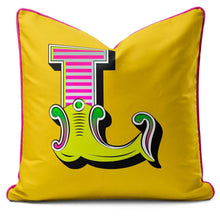 Charger l'image dans la galerie, Letter cushion in vibrant yellow with carnival-style letter 'L' design.