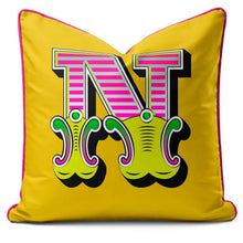 Charger l'image dans la galerie, Letter cushion featuring the bold letter N in vibrant carnival colors on a yellow background.