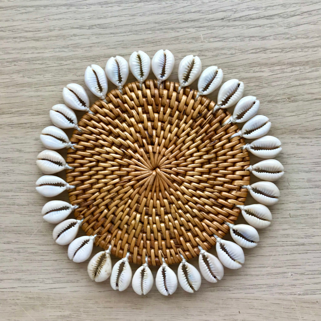 Balinese round rattan coaster with cowrie shells