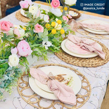 Lade das Bild in den Galerie-Viewer, Beautifully set table with woven rattan placemats, pink napkins, and floral centerpiece for a bohemian dining experience.
