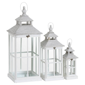 Set of three white wooden lanterns