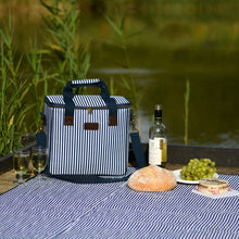 Afbeelding in Gallery-weergave laden, Cooler bag in a clasic blue and white stripe design in a garden setting
