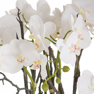 Large white potted faux orchid in a stone pot