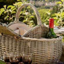 Load image into Gallery viewer, Picnic basket with wine bottle and glasses, ideal for outdoor meals and picnics for four people.
