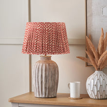 Charger l'image dans la galerie, Table lamp with mushroom pleat chevron design lampshade and ceramic base in a stylish interior setting.

