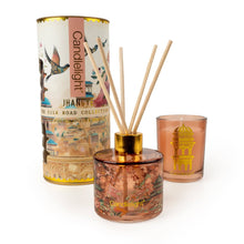 Afbeelding in Gallery-weergave laden, Home fragrance gift set featuring Jhangye scented reed diffuser and votive candle in peach-amber glass.

