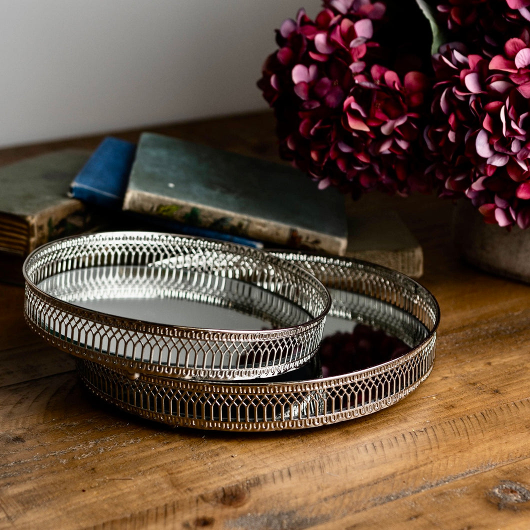 Set of two circular nickel plated trays