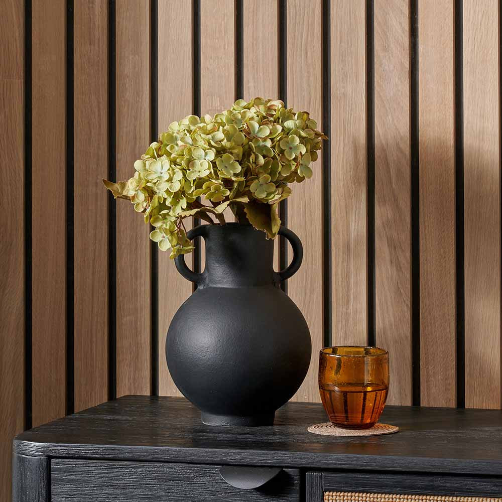 Black metal vase with handles