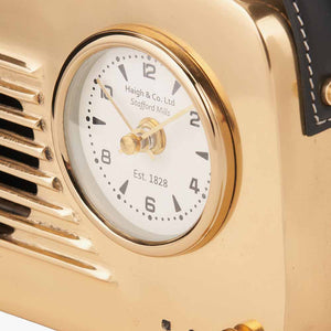 Retro silver or gold metal radio style clock