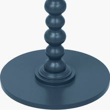 Lade das Bild in den Galerie-Viewer, Close-up of a side table with a bobble stem leg design in a dark blue finish.
