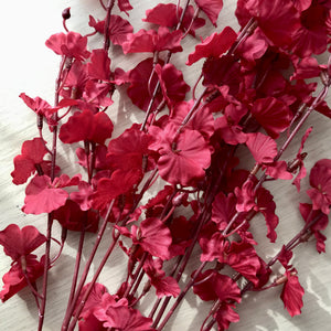 Deep burgundy faux orchid spray