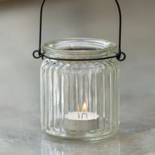 Charger l'image dans la galerie, Glass lanterns with a zink handle with a lit tealight inside
