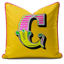 Charger l'image dans la galerie, Letter cushion in vibrant yellow with a carnival-style 'C' design, perfect for home decor.
