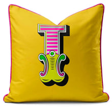Charger l'image dans la galerie, Letter cushion in vibrant yellow with a bold carnival-style 'T' design.
