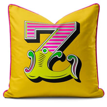 Charger l'image dans la galerie, Letter cushion featuring a vibrant yellow carnival font with the number 7, perfect for home decor.
