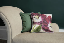 Lade das Bild in den Galerie-Viewer, Botanical cushion featuring Tulipa Trinita design by RHS artist Alfred Wise on a beige sofa.
