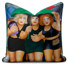 Charger l'image dans la galerie, Beryl Cook cushion featuring playful art of friends with umbrellas in vibrant colors, Clubbing in the Rain design.
