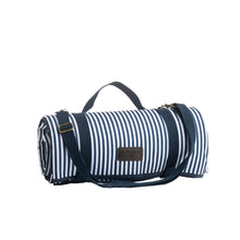 Indlæs billede til gallerivisning Picnic blanket in a blue and white design  rolled up with a strap and handles and shoulder strap
