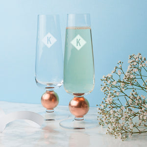 Monogrammed LSA set of two rose gold champagne glasses