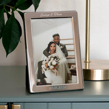 Charger l'image dans la galerie, Personalised silver plated photo frame showcasing a wedding portrait with names Evelyn &amp; Thom and date 13.01.2026.

