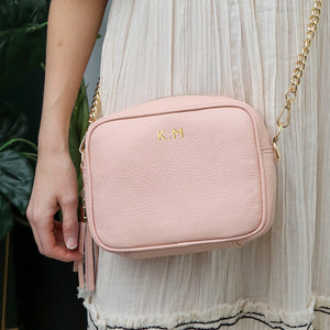 Personalised Elie Beaumont blush pink bag with a gold chain strap