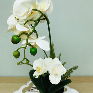 Small white potted faux orchid