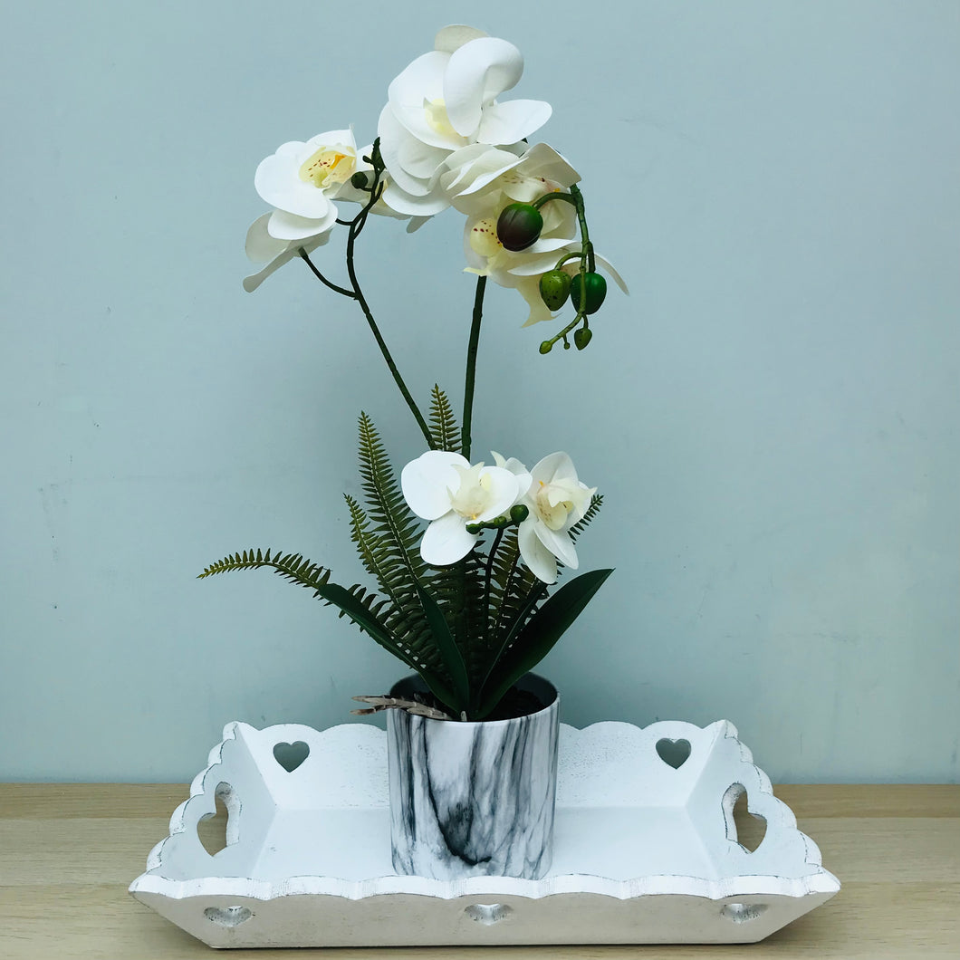 White potted faux orchid