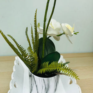 Small white potted faux orchid