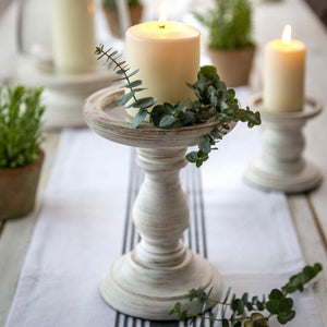White wooden pillar candle holder