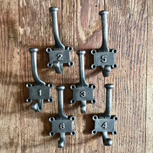 Charger l&#39;image dans la galerie, Cast iron numbered set of school hooks
