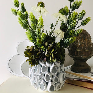 Textured white ceramic vase