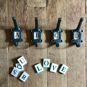 Alphabet cast iron & tile letter hook