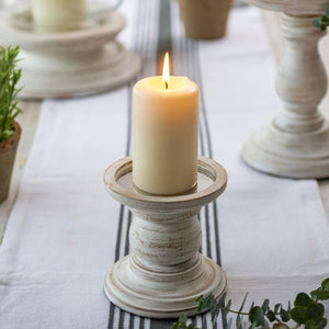 White wooden pillar candle holder