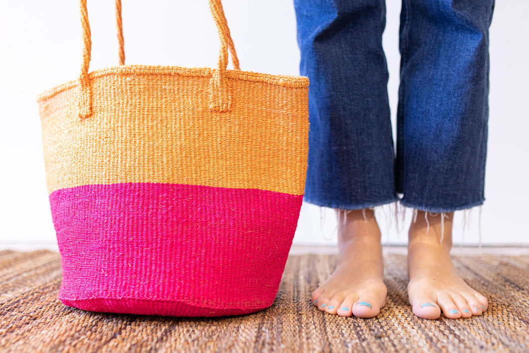 Orange & pink shoppers basket hand woven from Sisal in Kenya