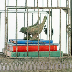 Cast iron bird in antique green